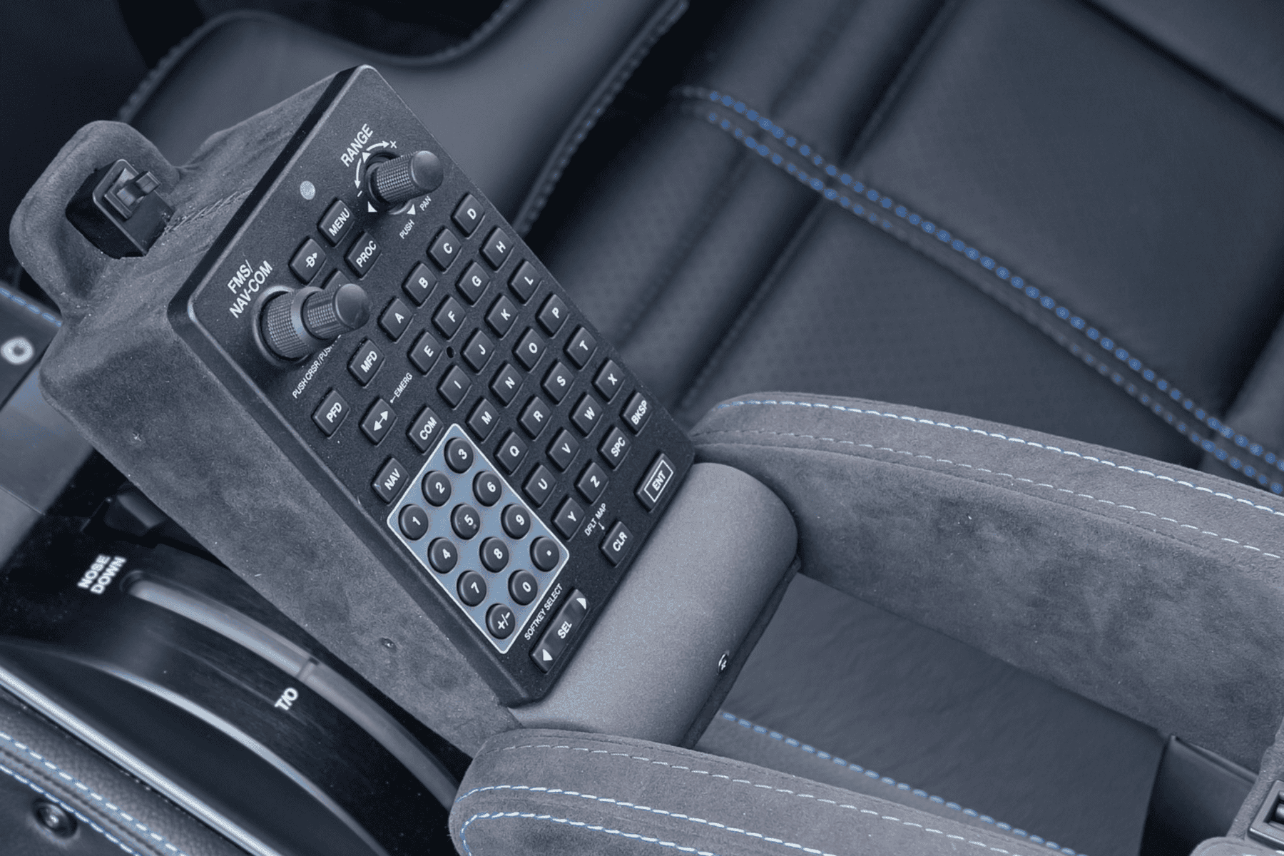 Close-up of car control panel on seat