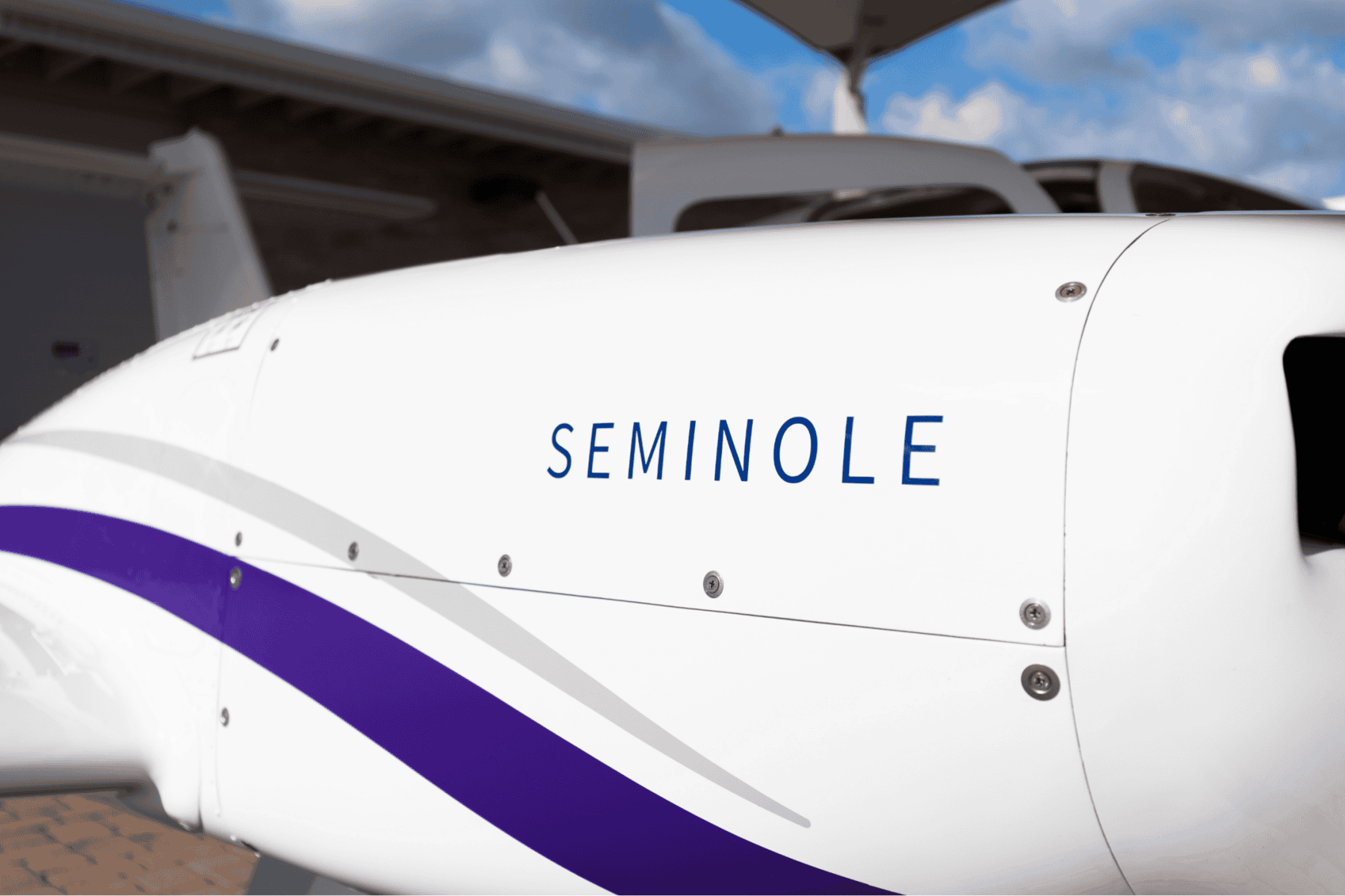 SEMINOLE airplane engine exterior with blue sky