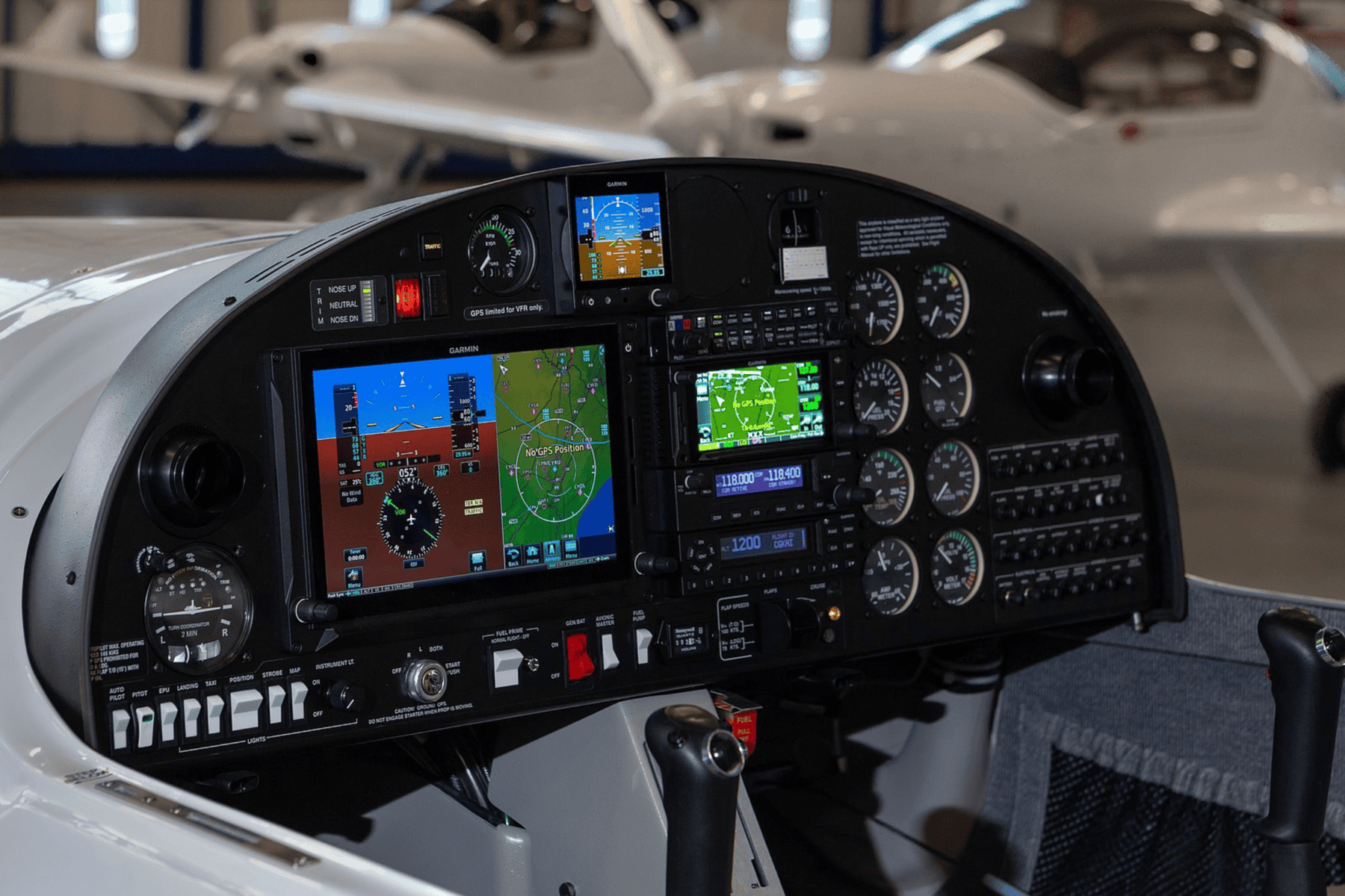 Airplane cockpit with electronic flight instruments.