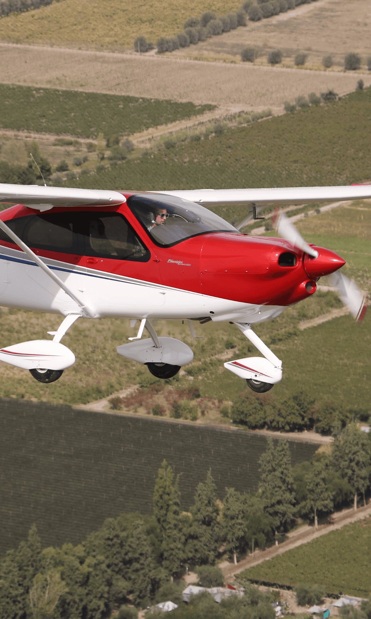 Blue small aircraft parked on runway.